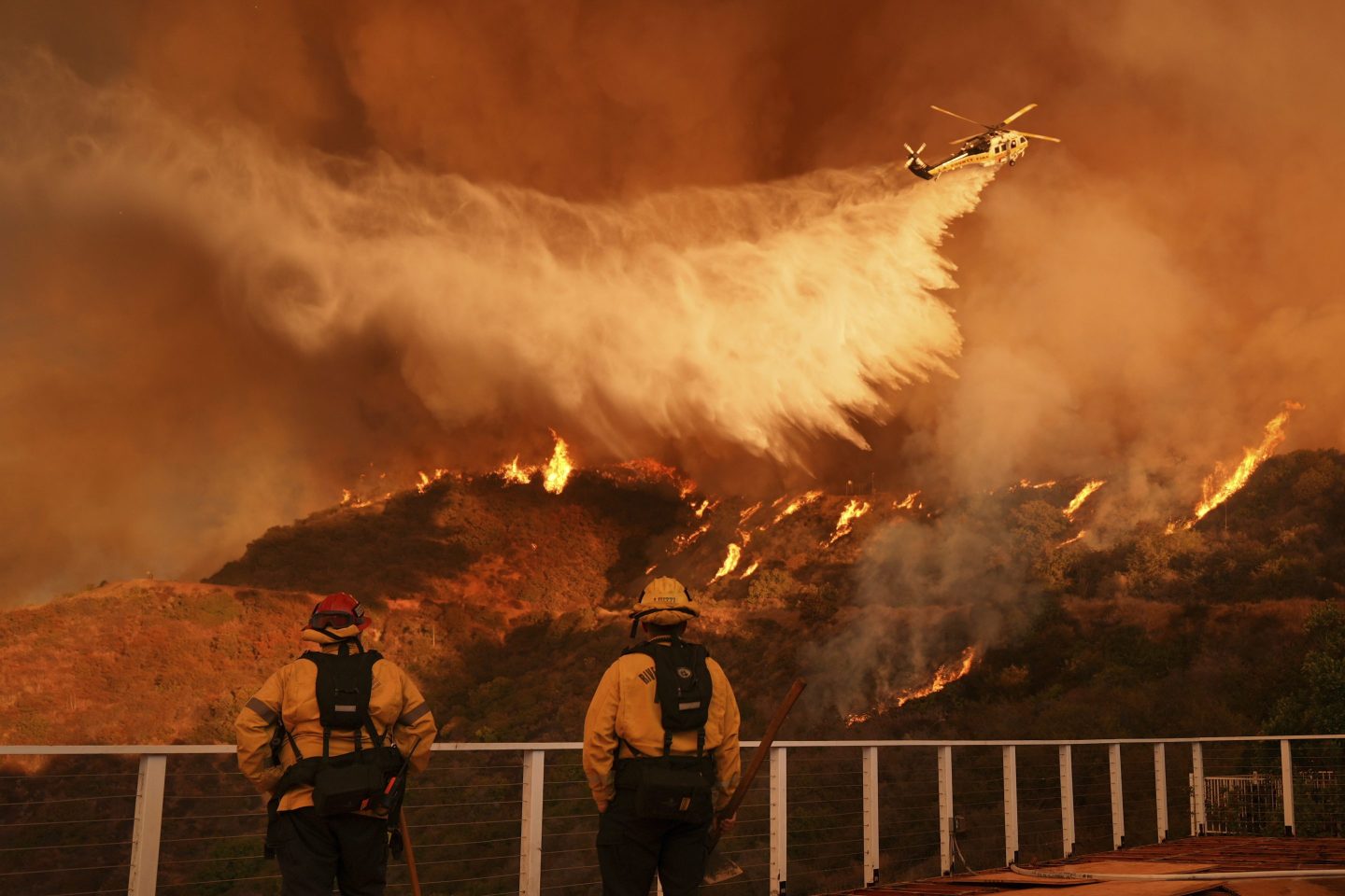 Firefighters race to stop spreading wildfires before strong winds threaten UCLA, Getty Museum — ‘We need to be aggressive out there’