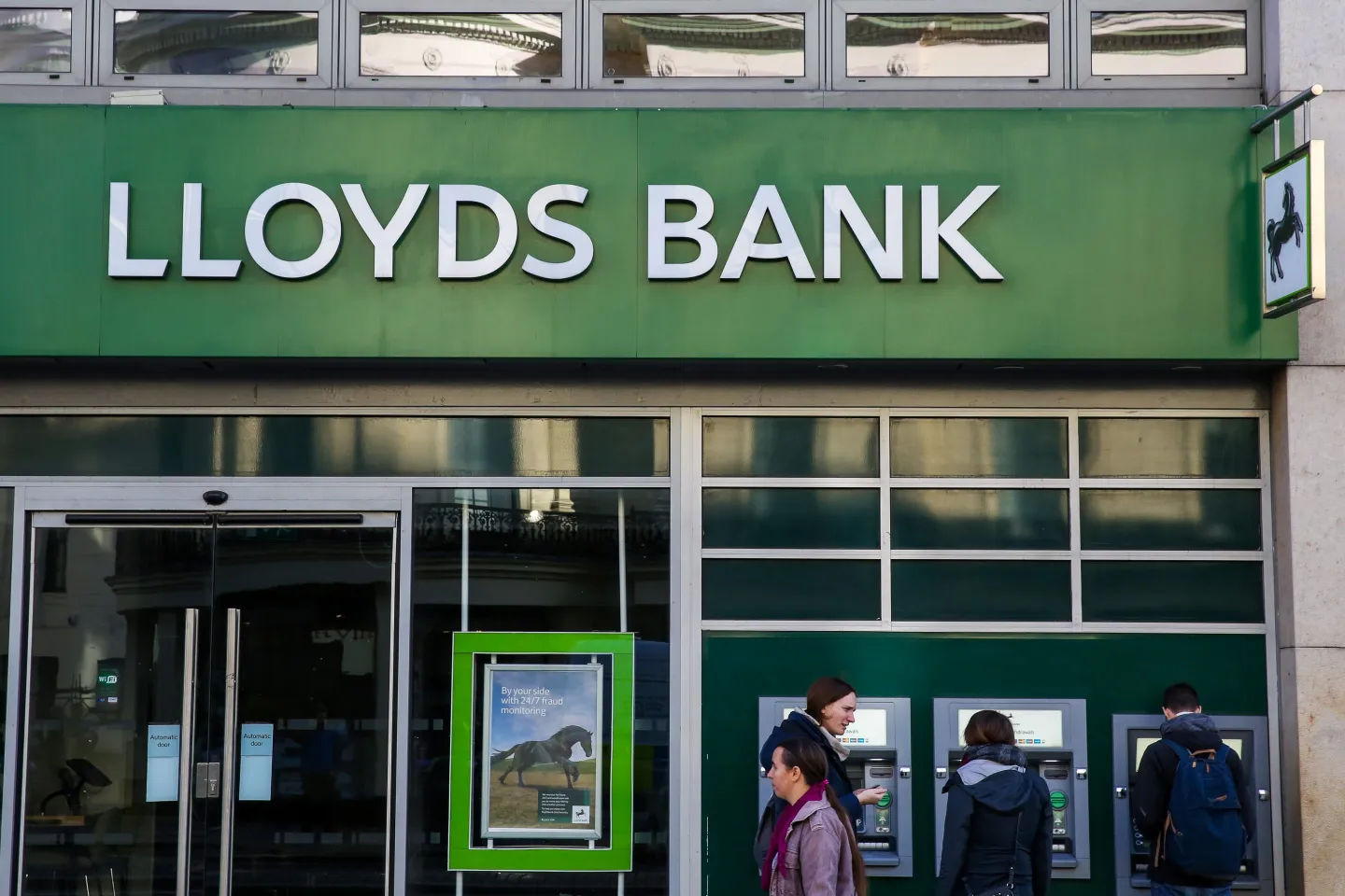 people outside a Lloyds Bank branch