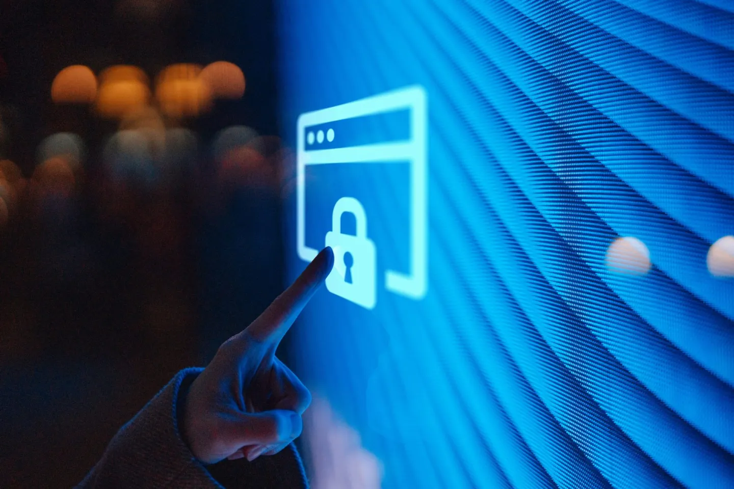 Person points finger and touches floating illuminated blue lock.