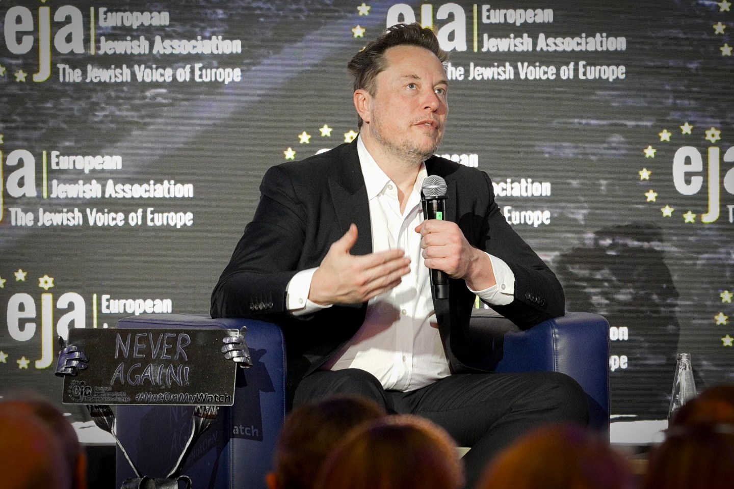 Elon Musk is seen taking part in a conference organised by the European Jewish Association