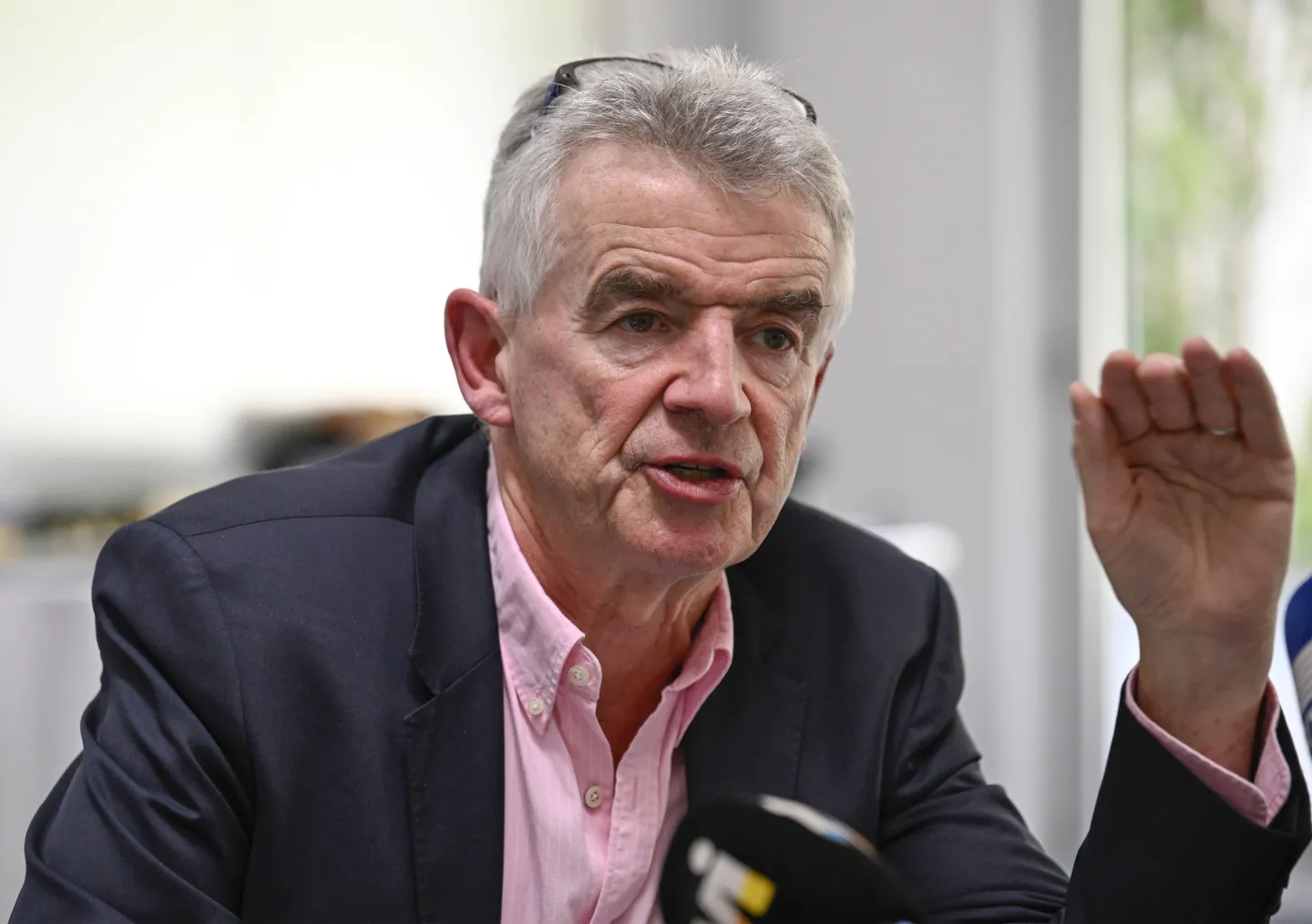 Ryanair Group CEO Michael O'Leary gestures while making a point during a press conference with Eddie Wilson, CEO of Ryanair, and Jason McGuinness, Commercial Director, to talk about the future of the company's operation in the Portuguese market on July 23, 2024 in Lisbon, Portugal. on July 23, 2024 in Lisbon, Portugal.