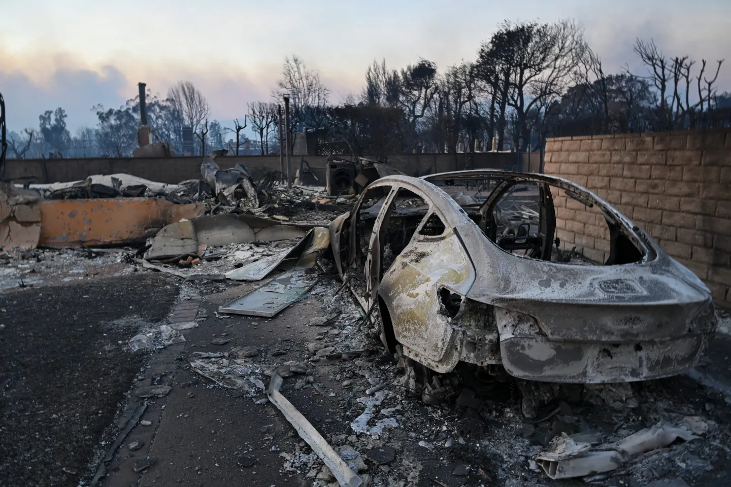 A scene of burned houses and vehicles in the Pacific Palisades neighborhood on Jan. 8, 2025.