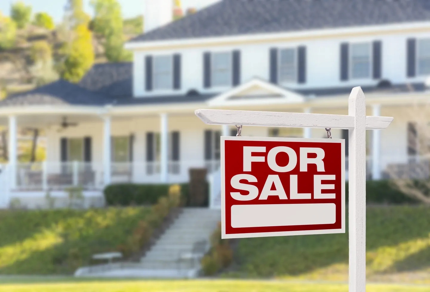 Home For Sale Sign in Front of New House.